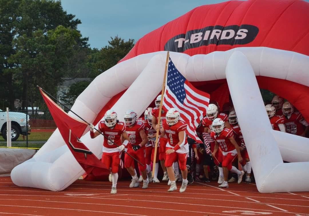 The T-Birds coming into the field on homecoming, keeping an advantage against West Babylon.